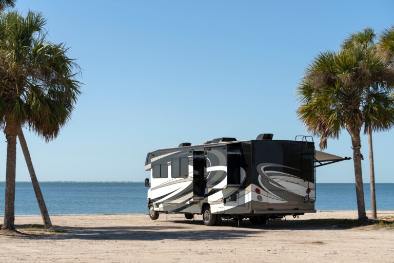 Road,Trip,In,Florida.,Camper,Motor,Home,On,Ocean,Beach