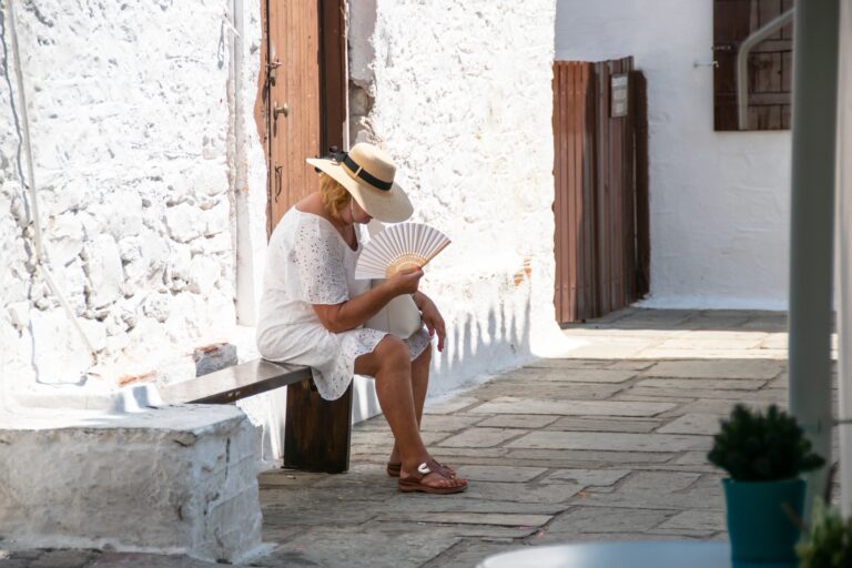Heatwave,Image,Of,A,Woman,Sitting,Down,In,The,Shade