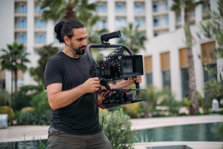 Director,Of,Photography,With,A,Camera,In,His,Hands,On