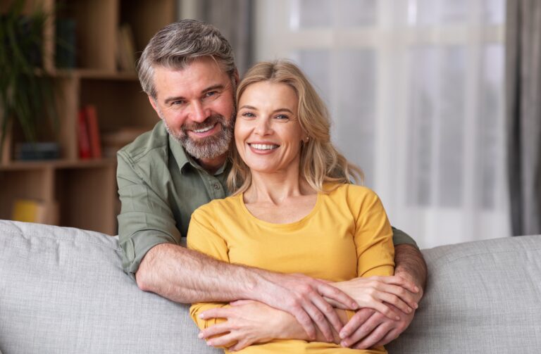 Portrait,Of,Happy,Middle,Aged,Husband,And,Wife,Posing,At